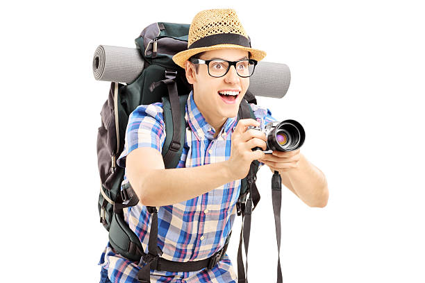 istock Male tourist with backpack taking a picture 477609487