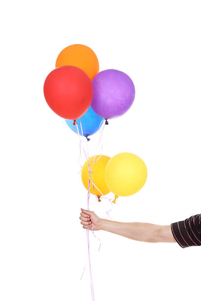 istock hand with colorful balloons 477609608