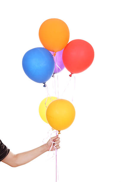 istock hand with colorful balloons 477609610