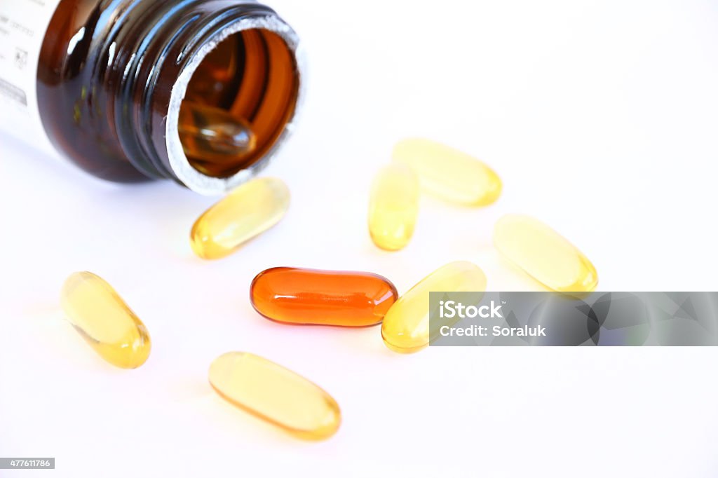 gel vitamin supplements on white group of gel capsules 2015 Stock Photo