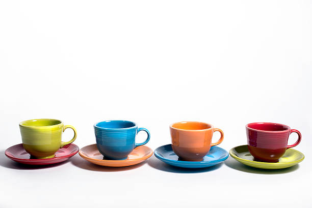 istock Row of colorful cups and saucers 477614171