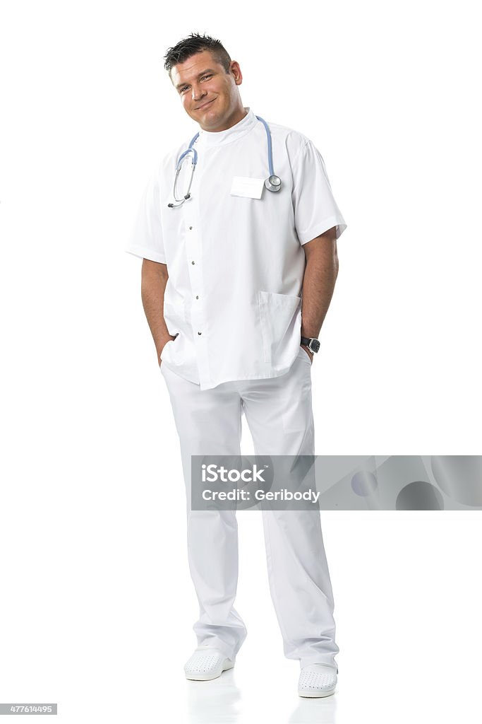 Handsome doctor in a white dress Handsome doctor in a white dress stands on white background Adult Stock Photo