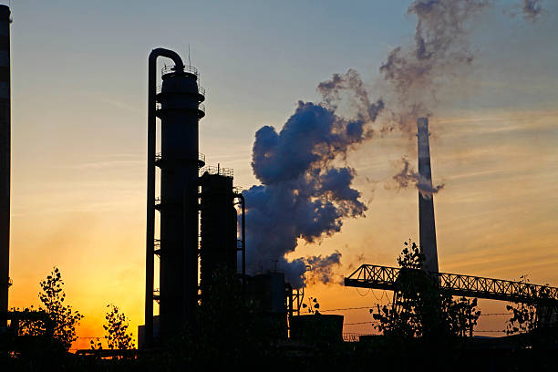 istock Industrial plant equipment in the sunset 477615852