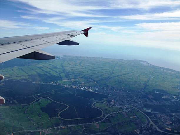 istock Aerial view from airplane airplane with beautiful sky 477615890