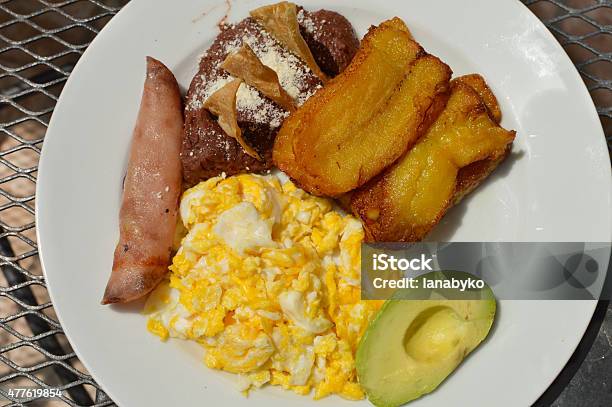 Typical Honduran Breakfast Of Eggs Plantain Avocado And Beans Stock Photo - Download Image Now