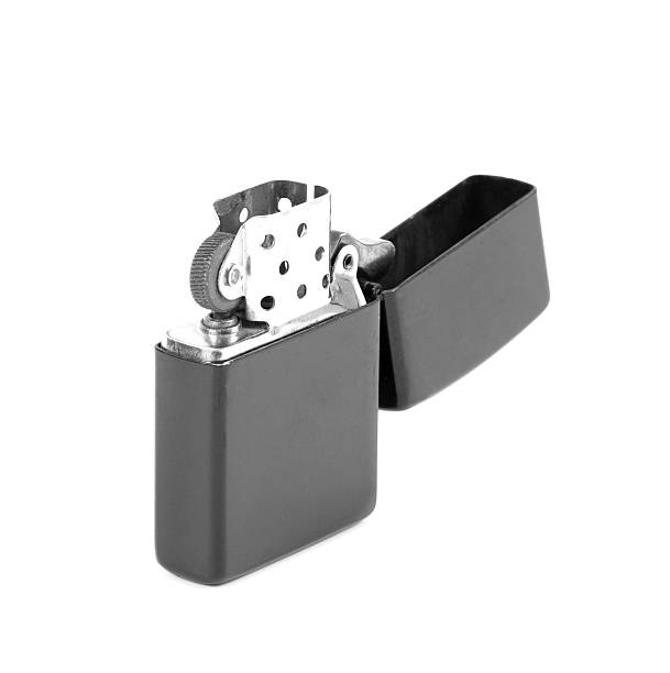 istock black metal gasoline lighter, isolated on white 477623422