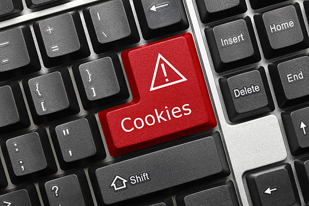 teclado conceptual de las cookies (rojo llave - symbol internet horizontal macro fotografías e imágenes de stock
