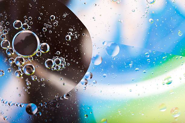 istock Abstract background of oil droplets on water surface 477624568