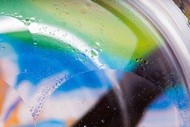 istock Abstract background of oil droplets on water surface 477624586