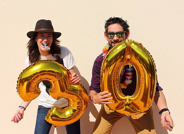 istock Cheerful couple celebrates a thirty years birthday 477624910