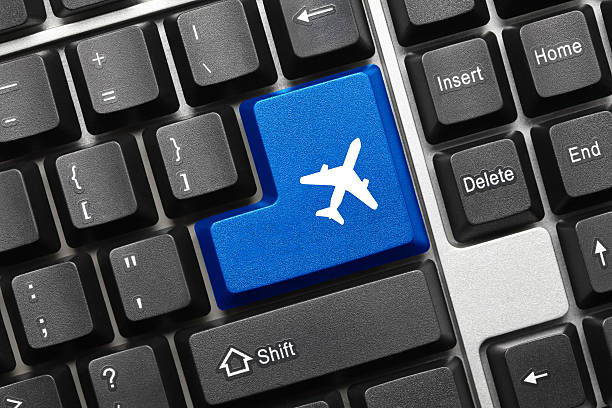 istock Conceptual keyboard - Blue key with airplane symbol 477625122