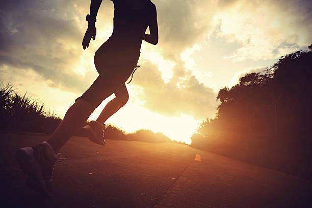 istock Runner athlete running at seaside road. 477628094