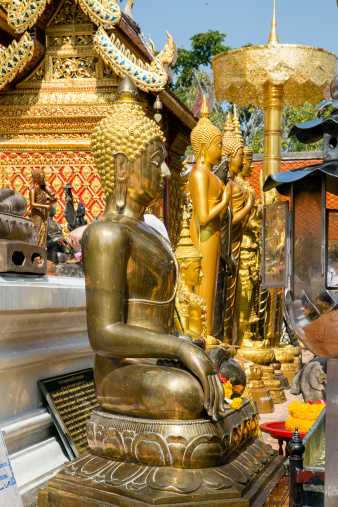 Buddha statue in Wat Doi Suthep - buddhist temple in Chiang Mai, Thailand.