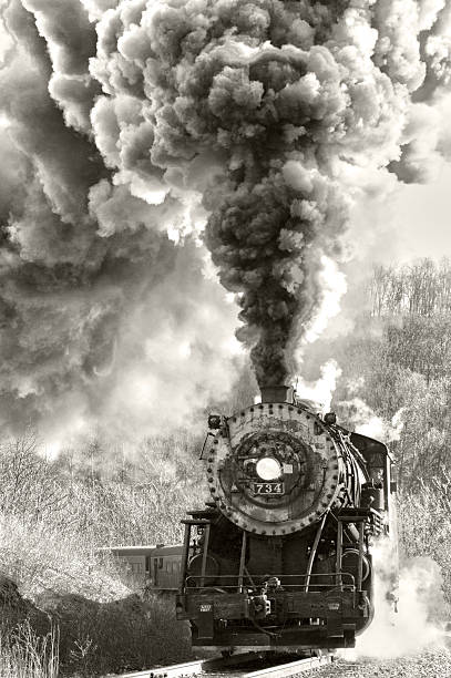 Steam Engine A black and white HDR photograph of the Western Maryland Scenic Railroad steam engine chugging along through Helmstetter's Curve. The image was manipulated to give it an old fashioned feel.  road going steam engine stock pictures, royalty-free photos & images