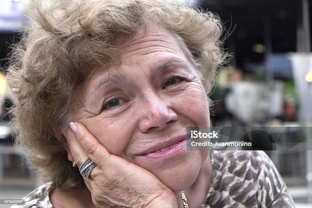 Smiling Senior woman Smiling Senior woman looking at the camera 60-69 Years Stock Photo