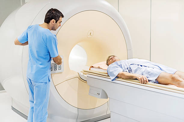 istock Mature man receiving an MRI Scan. 477634433