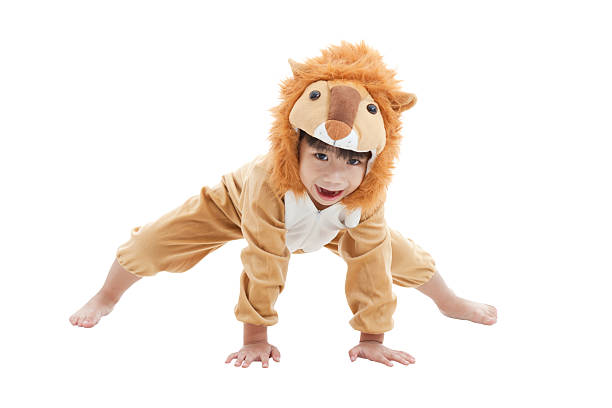 istock Cute little boy dressed in lion suit 477634804