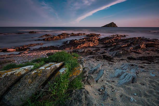 istock Seascape at twilight, with long exposure at Wembury Beach,Devon 477635702