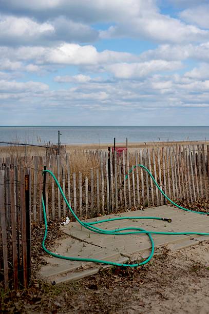 Hose Outside Beach stock photo