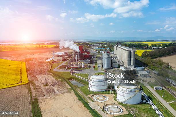Sunset Over Biofuel Factory Stock Photo - Download Image Now - Factory, Biofuel, Biomass - Renewable Energy Source