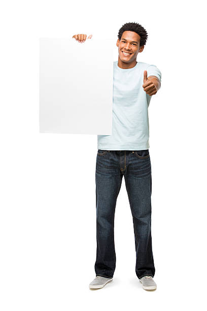 istock Casual young man with white sign 477639681