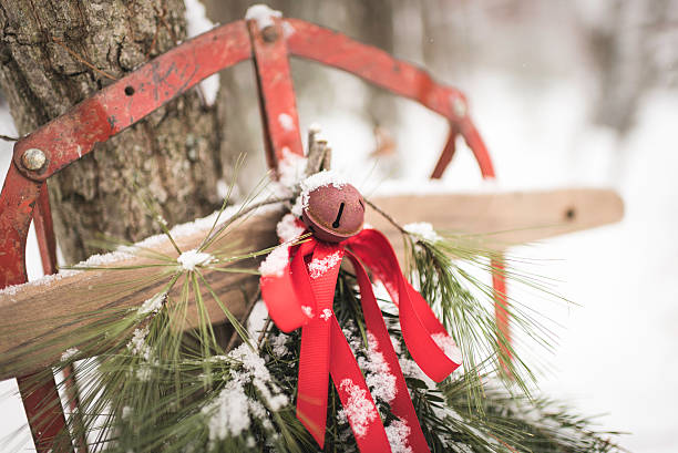 istock Antique Wooden Sled with Pine Against a Tree in Snow 477640180