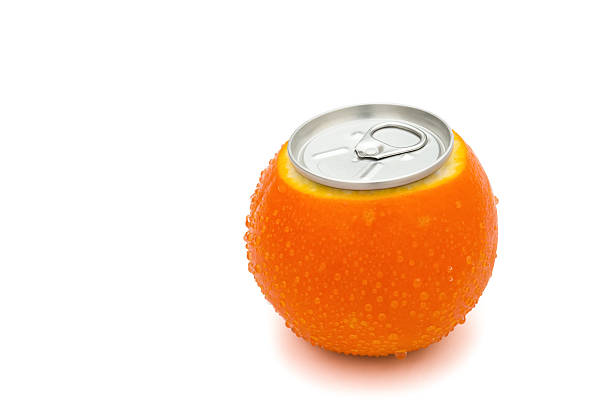 istock beverage can's top on a fresh orange with clipping path 477642125