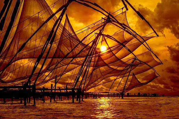 Chinese fishing net at sunset Kochi, Kerala, India.