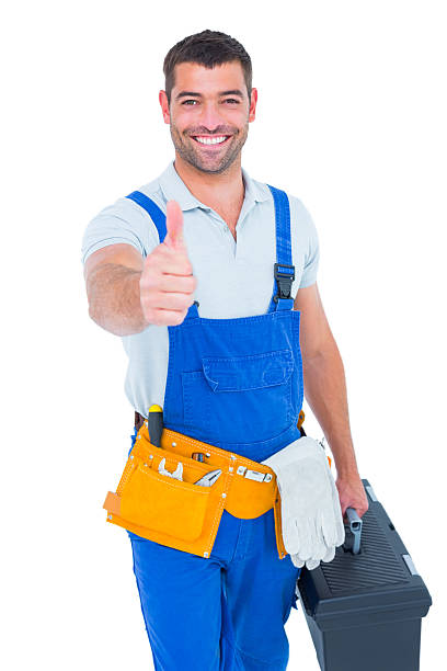 istock Happy repairman with toolbox gesturing thumbs up 477649838