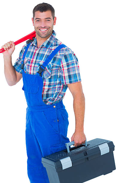 istock Happy repairman with toolbox and monkey wrench 477652108
