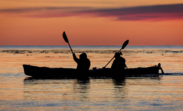 istock Two paddlers in a double kayak 477652633