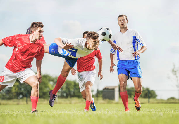 istock Soccer player heading the ball. 477653001