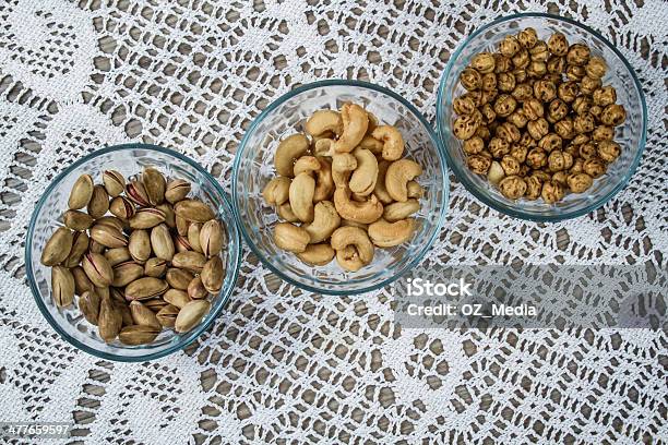 Assorted Nuts In Bowls Stock Photo - Download Image Now - Blue, Brown, Collection