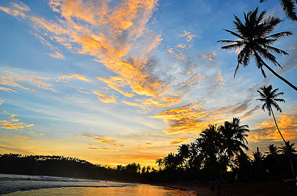 istock Beach sunset in summer on Hawaii with vibrant sky 477662770