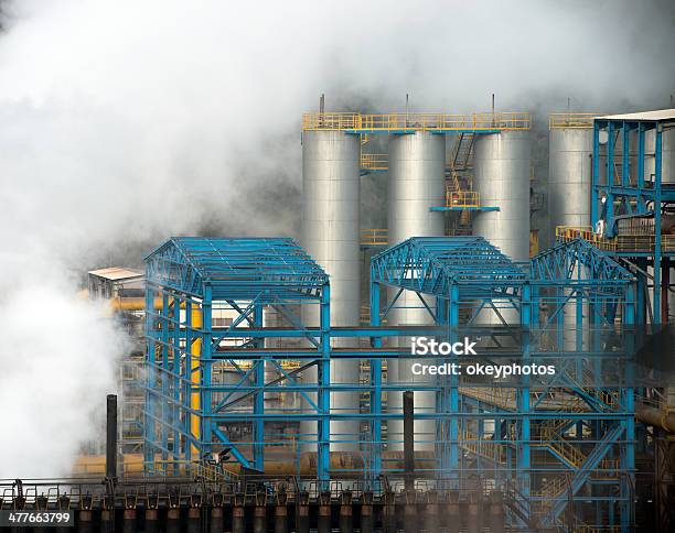 Industry Steaming And Smoking Stock Photo - Download Image Now - Air Pollution, Air Pump, Building Exterior