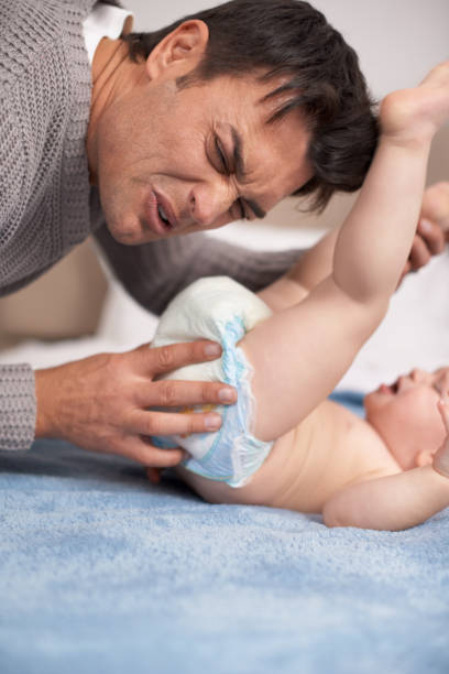istock Changing diapers is an awful job! 477664441
