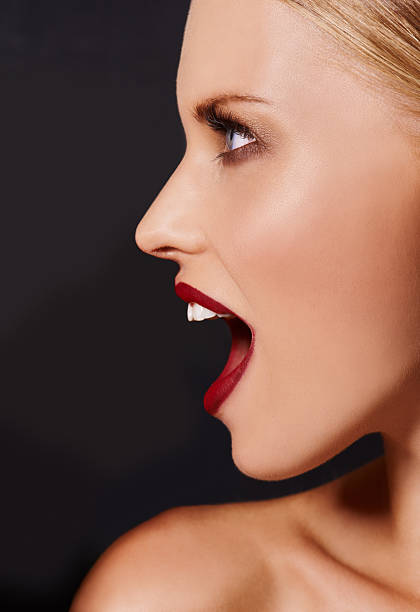 A stylish young woman with naturally radiant skin and soft, well-blended makeup posing confidently in a modern outfit. Her silky smooth hair and fashionable appearance reflect contemporary beauty and elegance, ideal for skincare, fashion, and lifestyle concepts. Captures the essence of modern feminine confidence and youthful charm