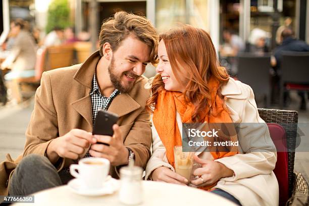 Young Couple Enjoying At Cafe In Autumn Stock Photo - Download Image Now - Adult, Adults Only, Affectionate