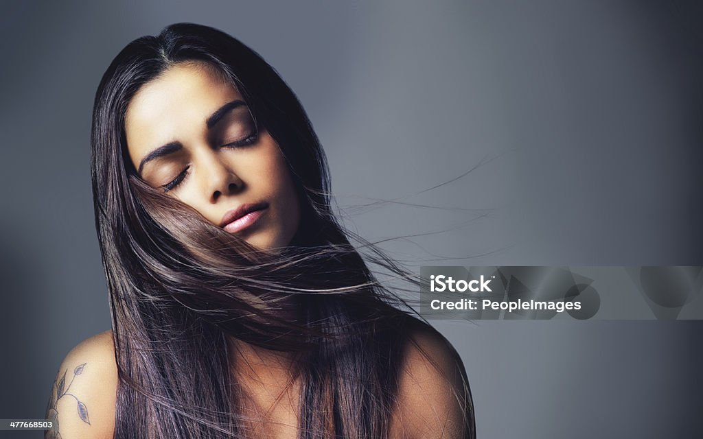 Her beauty is all natural Shot of a beautiful young woman in the studio Women Stock Photo