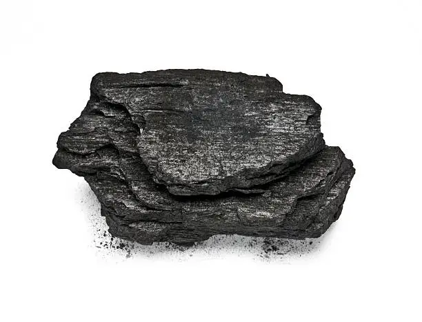 Piece of fractured wood coal isolated over white background. with clipping path