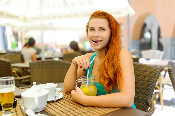 istock woman with lemonade 477669731
