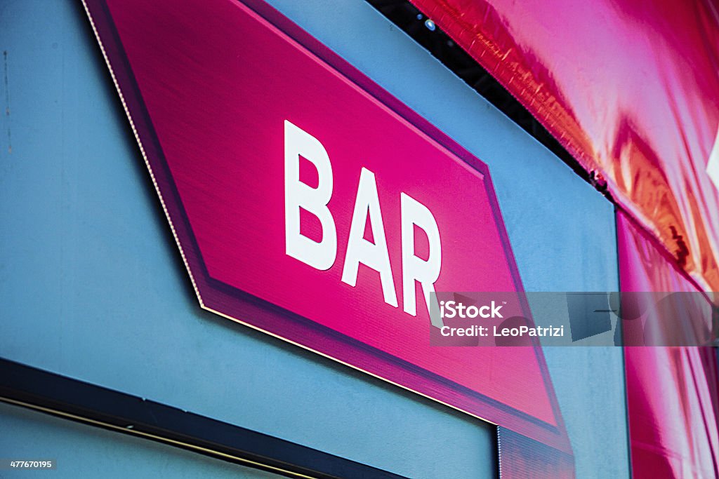 Bar sign White "bar" sign on red background. Alcohol - Drink Stock Photo