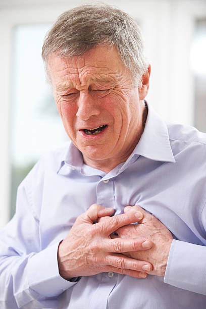 istock Senior Man Suffering Heart Attack At Home 477670581