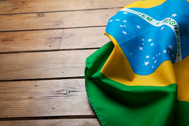 istock Brazilian flag on wooden background 477670695