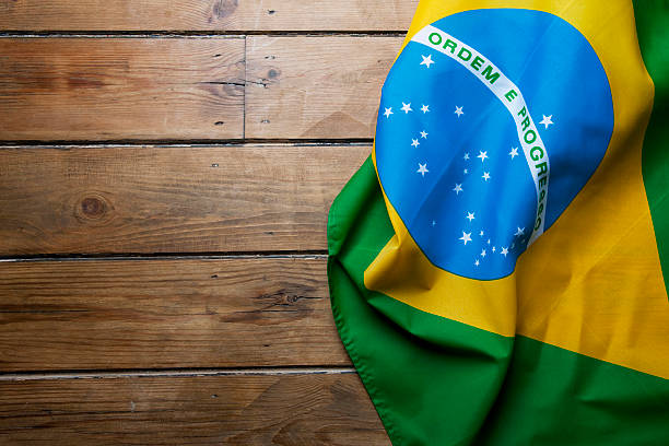 istock Brazilian flag on wooden background 477670707