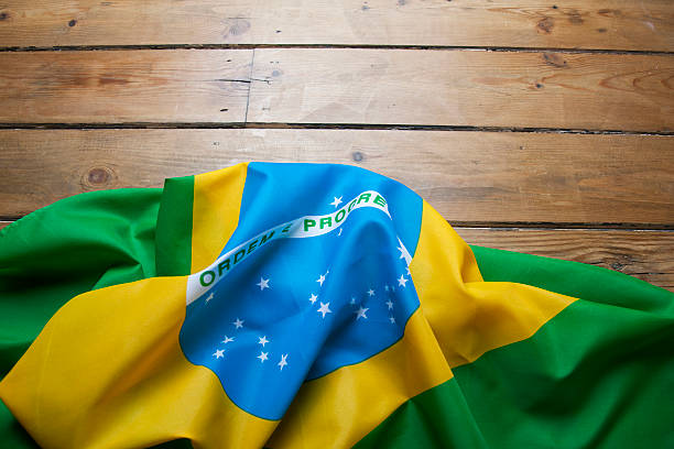 istock Brazilian flag on wooden background 477670723