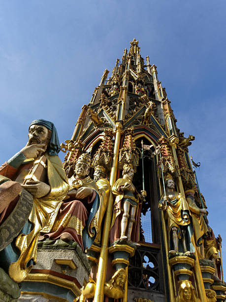 The Peak of the „Schöner Brunnen“, the famous fountain at the marketplace in Nuremberg, Franconia, Germany. The fountain was build in the 14th Century in gothic style. The figure shown at the right is Augustinus. The other three are \