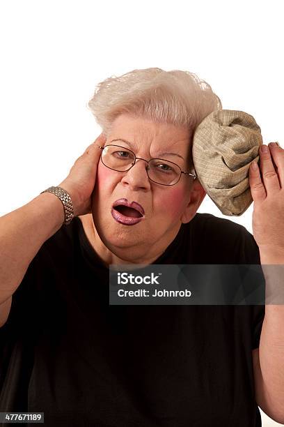 Photo libre de droit de Plus De Poids Femme Senior Avec Un Mal De Tête À Tête Sac De Glace banque d'images et plus d'images libres de droit de Adulte