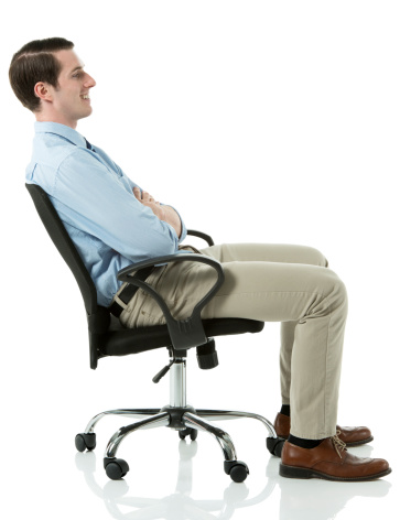 Side view of smiling businessman sitting on chairhttp://www.twodozendesign.info/i/1.png