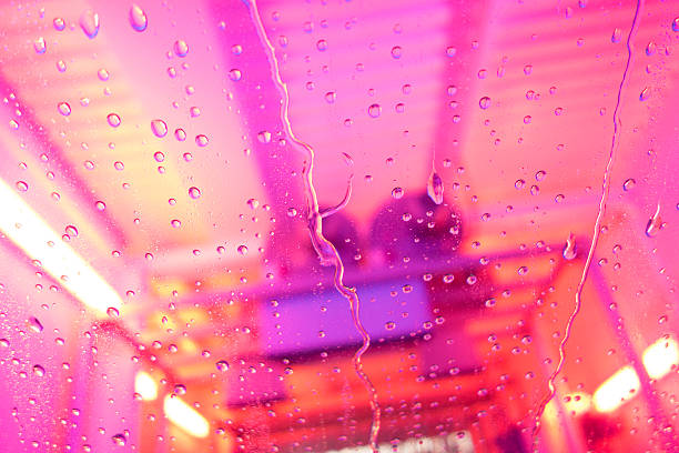 istock pink Wet Glass Background 477672285